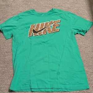 Nike Teal T-Shirt with Cheetah Print Logo
